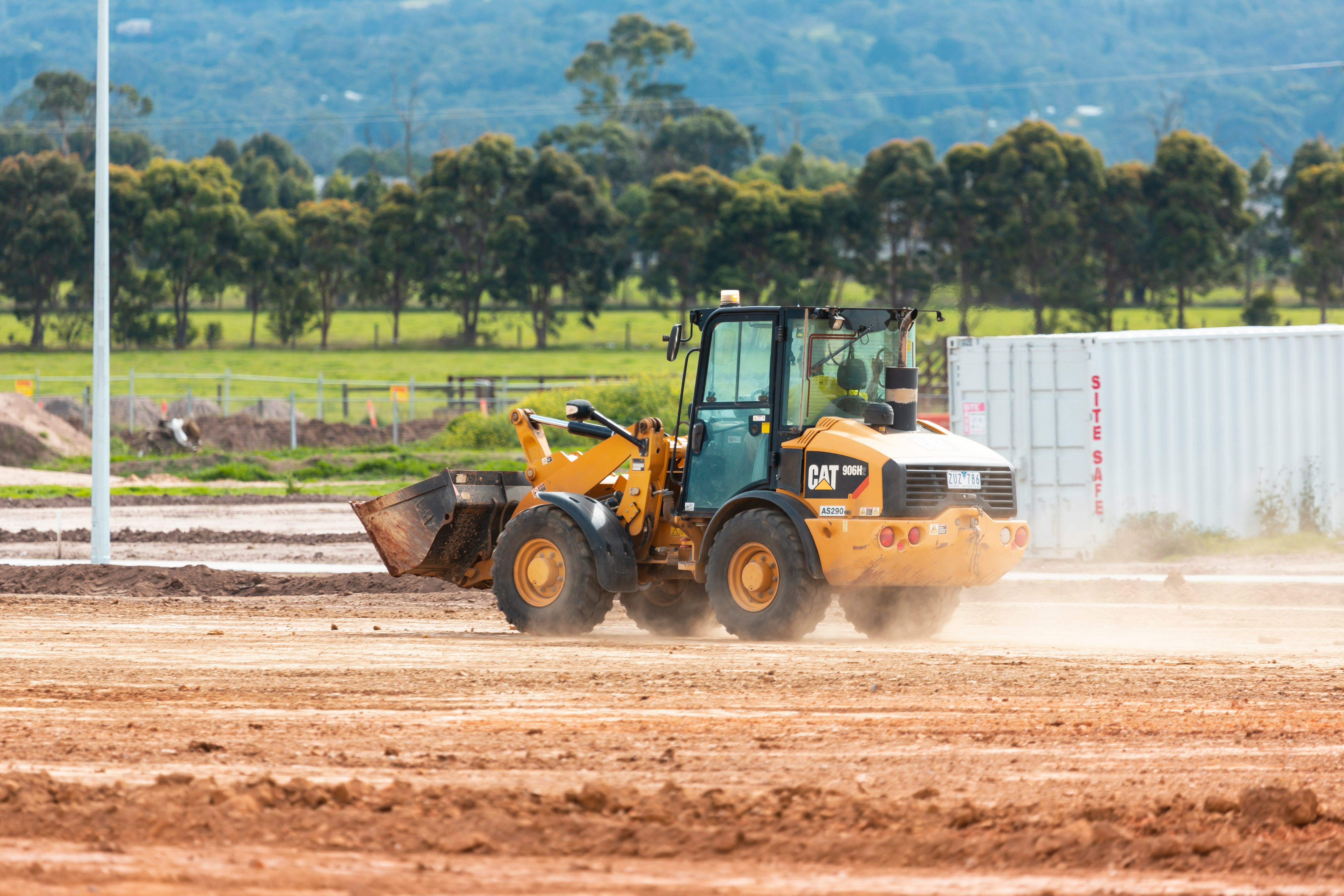 Digger at work at residential estate development.